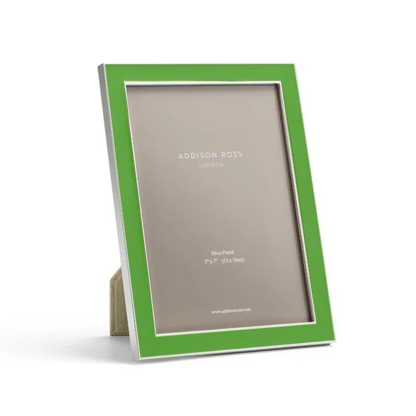 A green and silver picture frame with a built-in stand, shown on a clean white background. The frame has a bright green outer border, a silver inner border, and a silver side edge