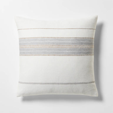 Decorative pillow with horizontal stripes on a light gray background