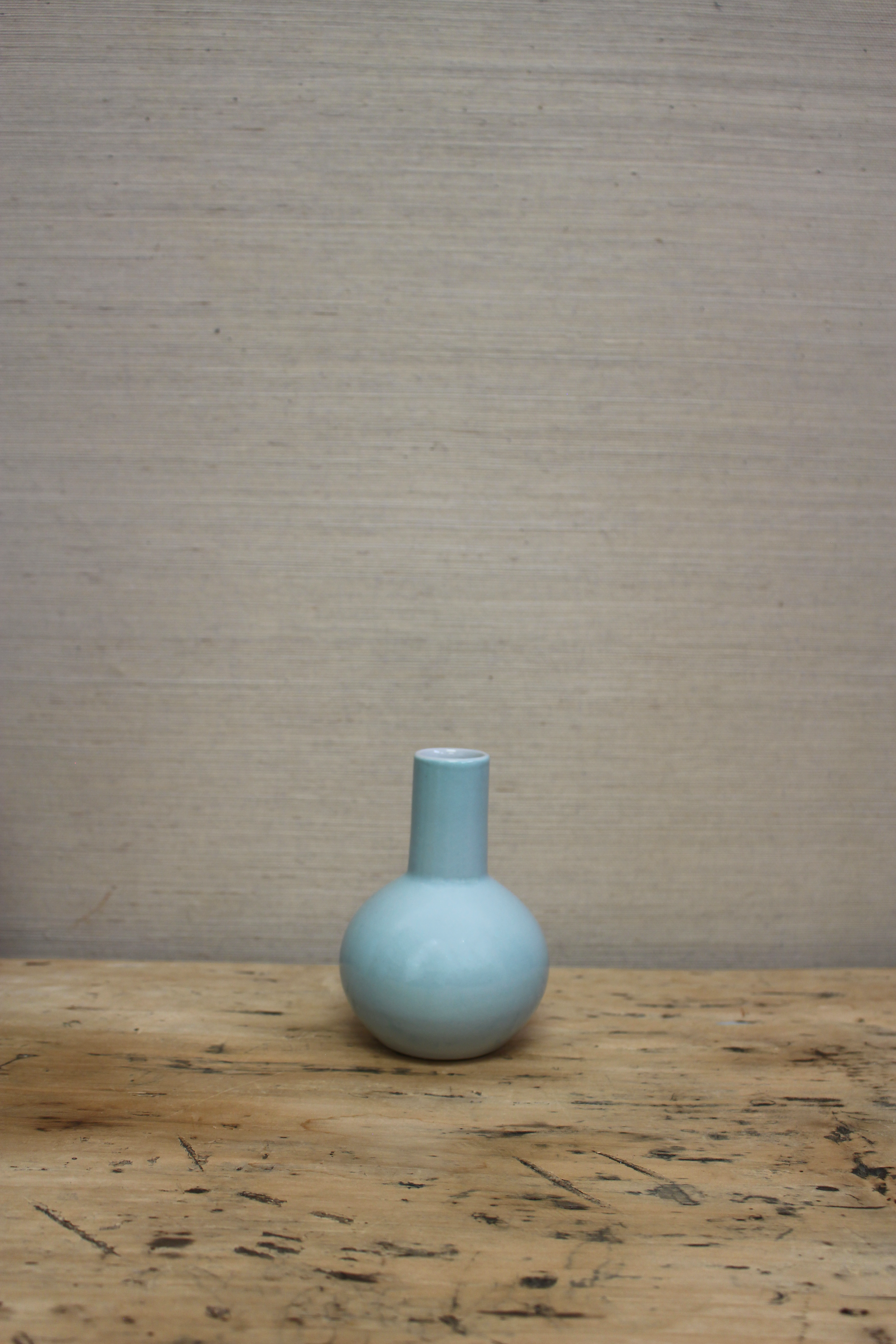 small icy blue bud vase