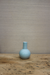 small icy blue bud vase