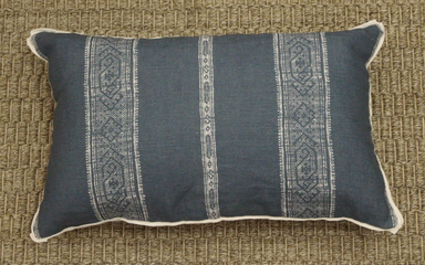 slate blue textile pillow with stripe design