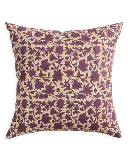 A square throw pillow featuring an intricate floral and vine pattern in deep purple and beige, set against a plain white background.