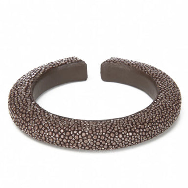 Brown textured bracelet on a white background