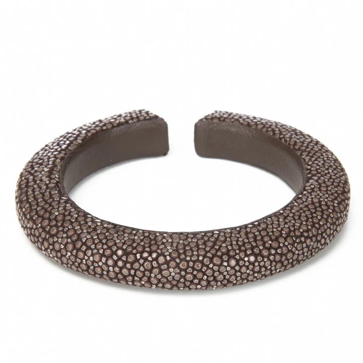 Brown textured bracelet on a white background