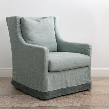 mint green linen slipcovered chair