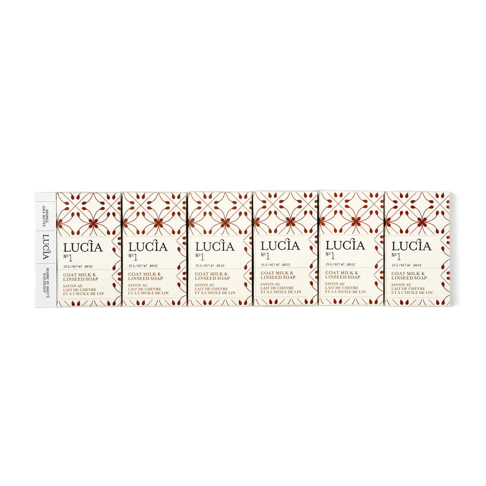 Lucia soap bars with decorative packaging on a white background