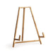Gold metal easel on a white background