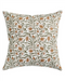 Decorative pillow with pomegranate and leaf pattern on a white background