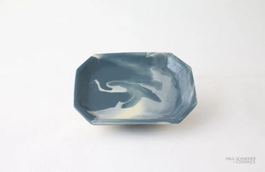 Blue ceramic glazed tray on a white background