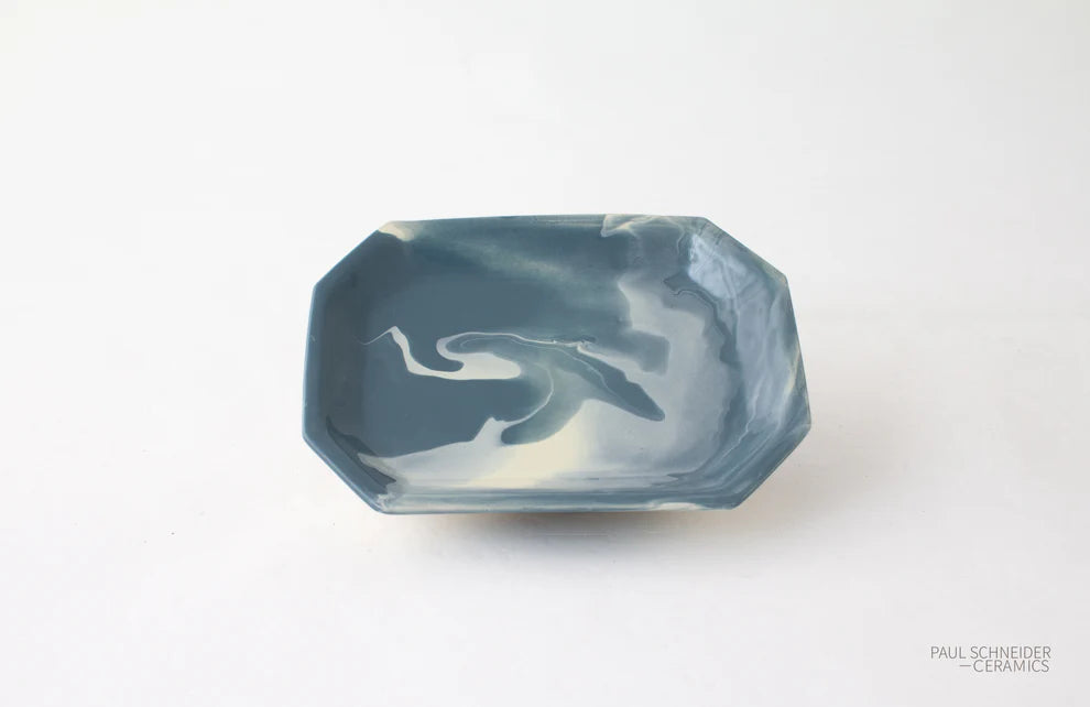 Blue ceramic glazed tray on a white background