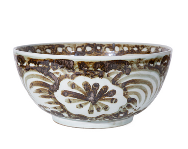 side view of brown and white ceramic bowl