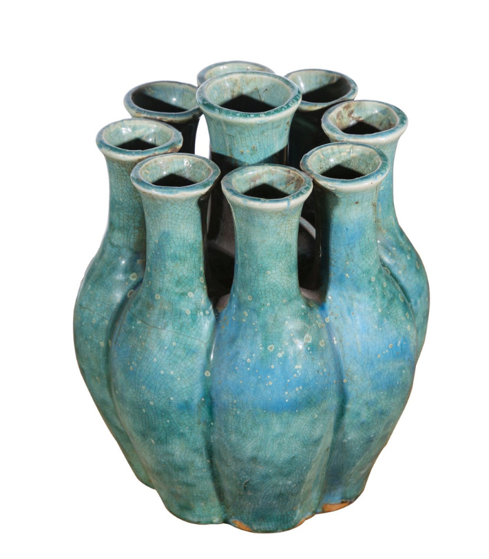 blue-green speckled vase with nine openings