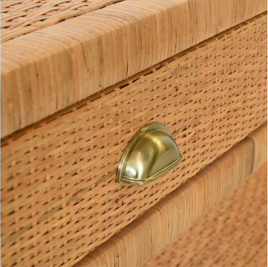 detail of brass pull on rattan side table