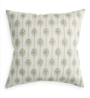 square linen pillow with graphic block printed design in green and blue on a natural background