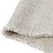 Frayed edge of flax color linen placemat