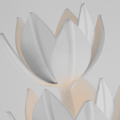 detail of plaster white petals around LED bulb