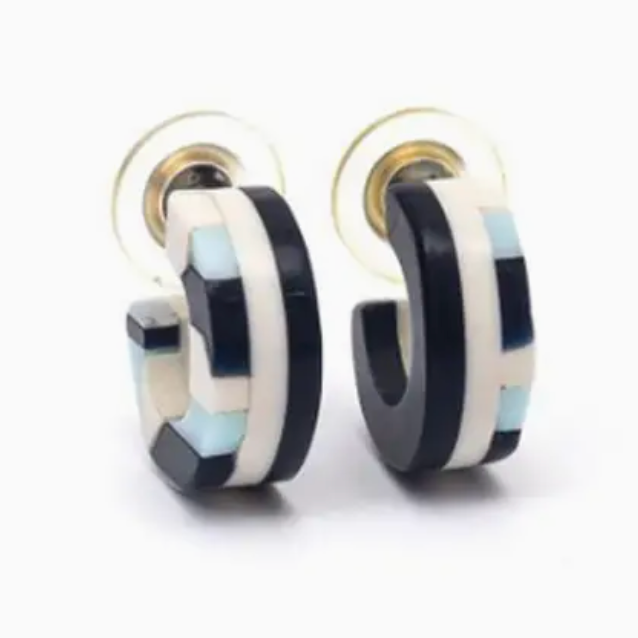 front view of black, white, and blue acrylic hoop earrings