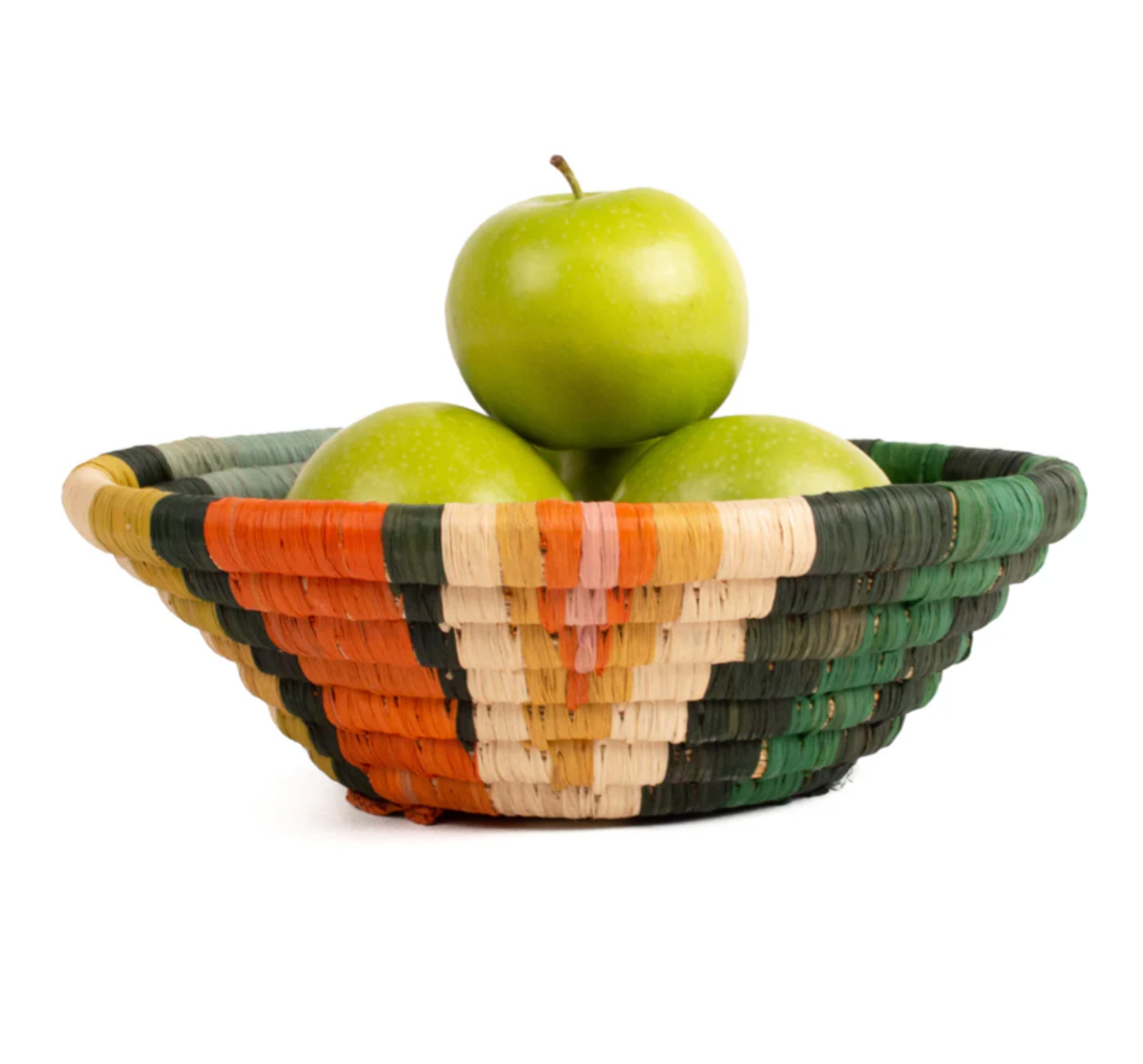 colorful basket holding green apples