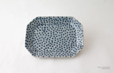Rectangular ceramic plate with blue dot pattern on a white background, branded 'Paul Scheffer Ceramics'.