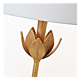 A close-up of a light brown wooden lotus flower lampshade or decorative shade component with a white curved top edge visible against a white background.