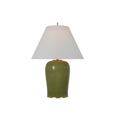 Green table lamp with a white shade on a white background