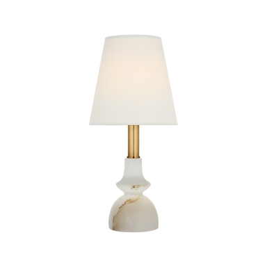 A modern table lamp with a white tapered fabric shade, a brushed gold metal stem, and a white onyx marble base with subtle gold veining, shown against a solid white background.