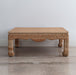 wicker coffee table with curved apron and Asian-influenced style legs