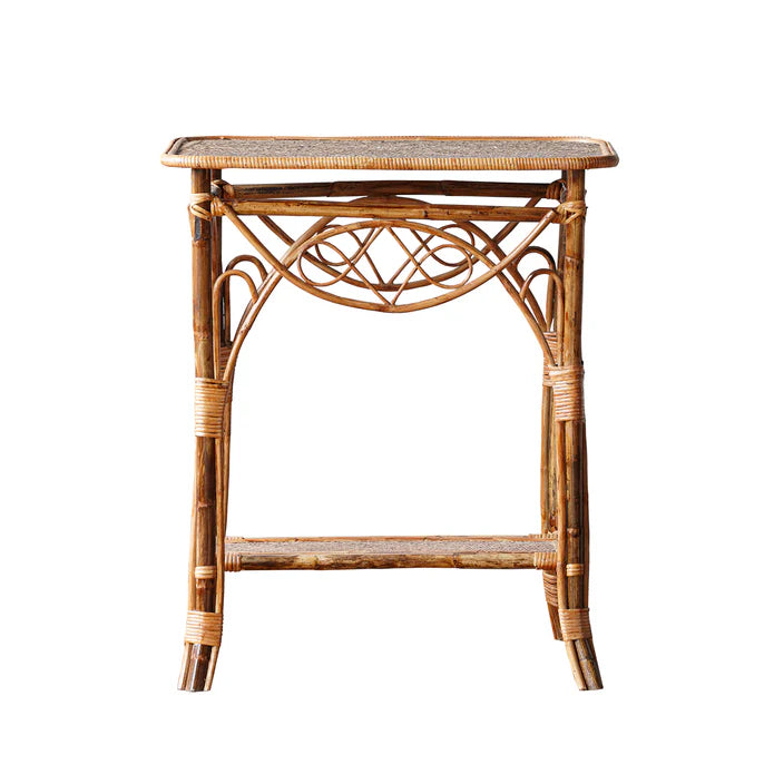 Wicker side table with woven design on a white background