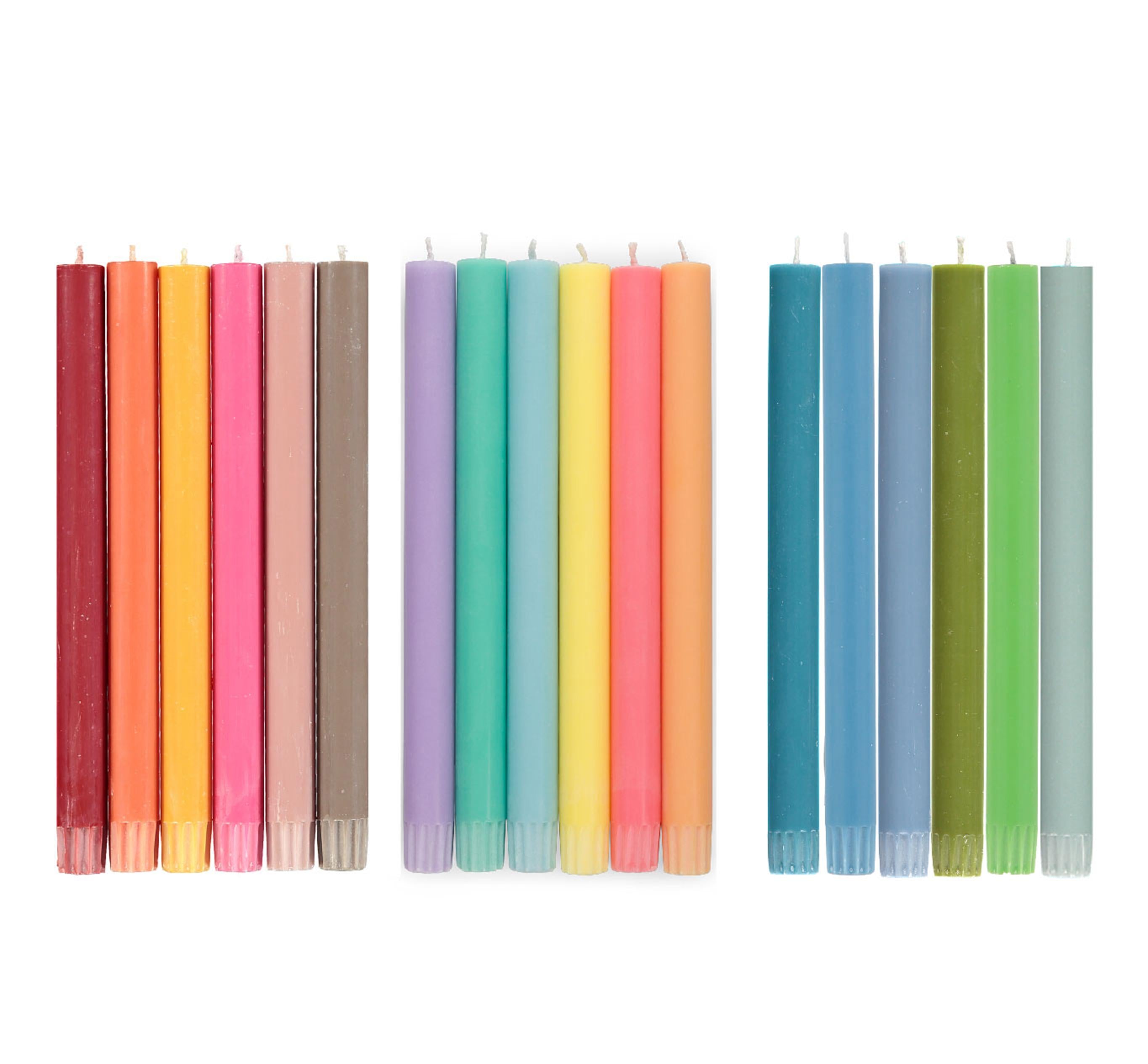 Set of colorful candles in various shades on a white background