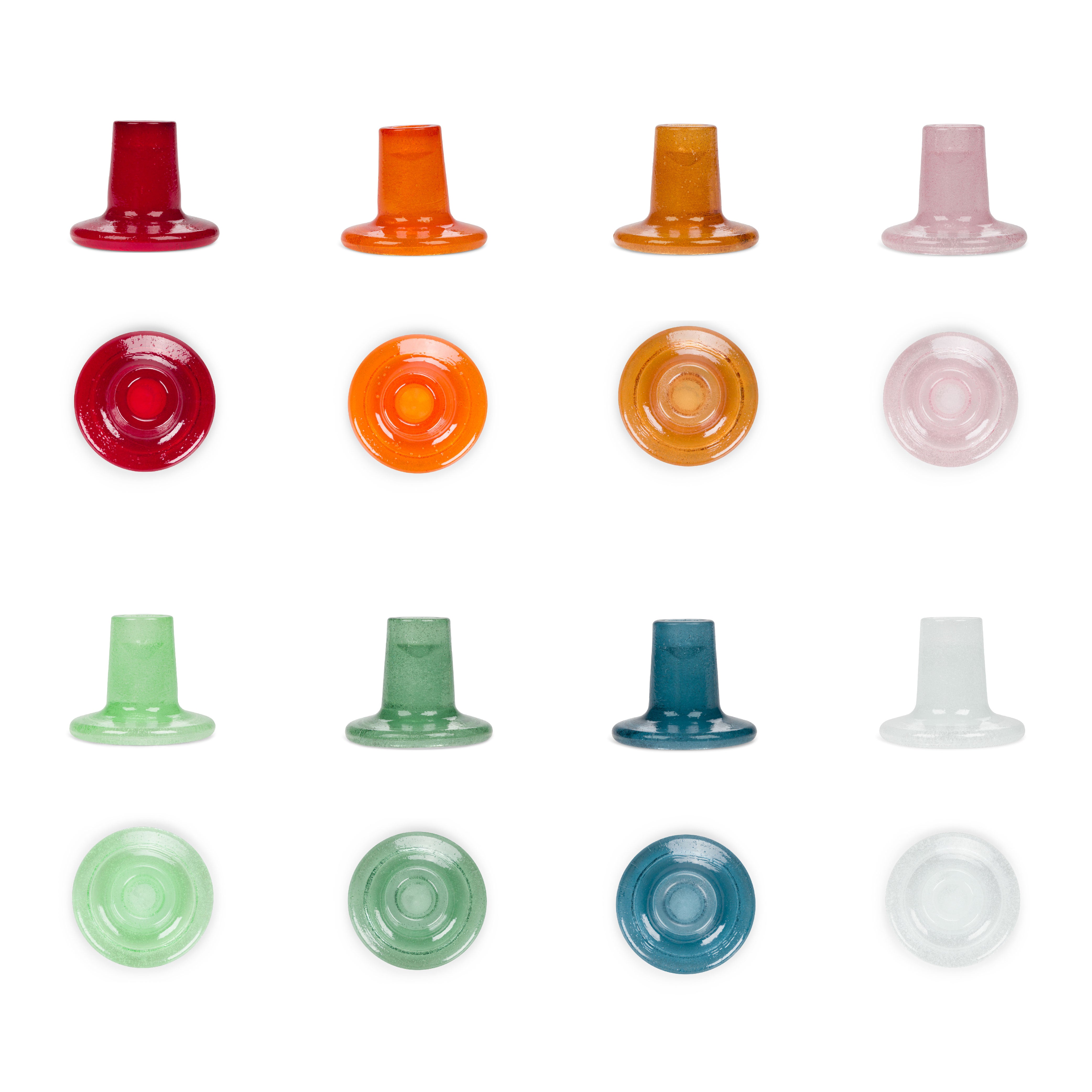 Set of colorful coffee capsules on a white background