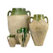 Four ceramic vases with green accents on a white background