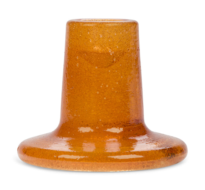 Brown glass candleholder on a white background