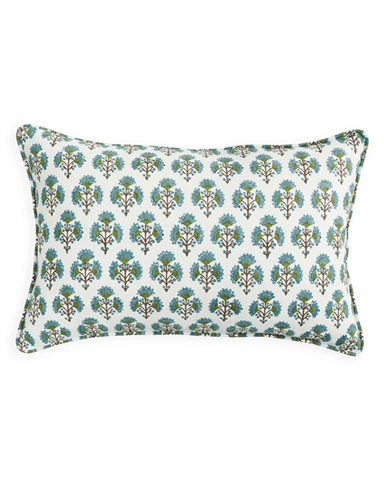 Decorative pillow with floral pattern on a white background