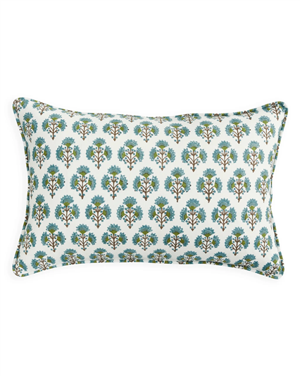 Decorative pillow with floral pattern on a white background