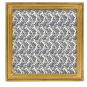 Framed artwork with a blue leaf pattern on a white background