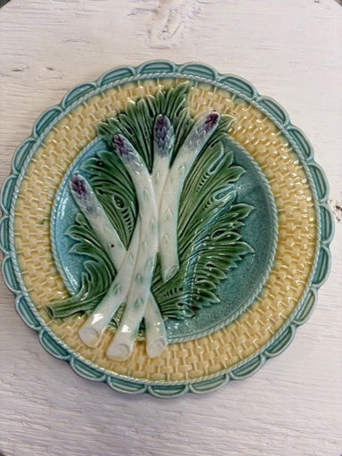 Ceramic plate with decorative design on a white surface