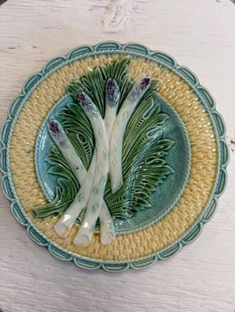 Ceramic plate with decorative design on a white surface