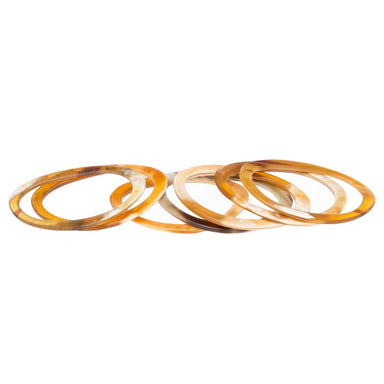 Set of Buffalo horn bangles on a white background