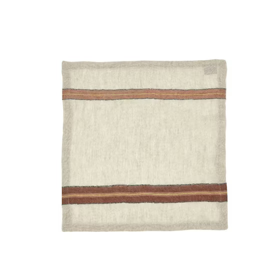 Textured linen napkin with horizontal stripes on a white background