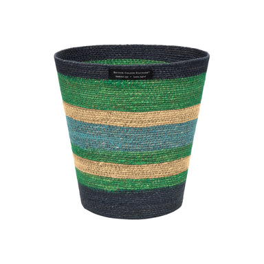 Striped woven basket with green, blue, and beige pattern on a white background