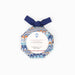 A marbled octagonal ornament picture frame with a navy blue ribbon bow at the top, featuring a central white label with blue and orange wave patterns.