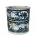 Blue and white ceramic vase with floral patterns on a white background