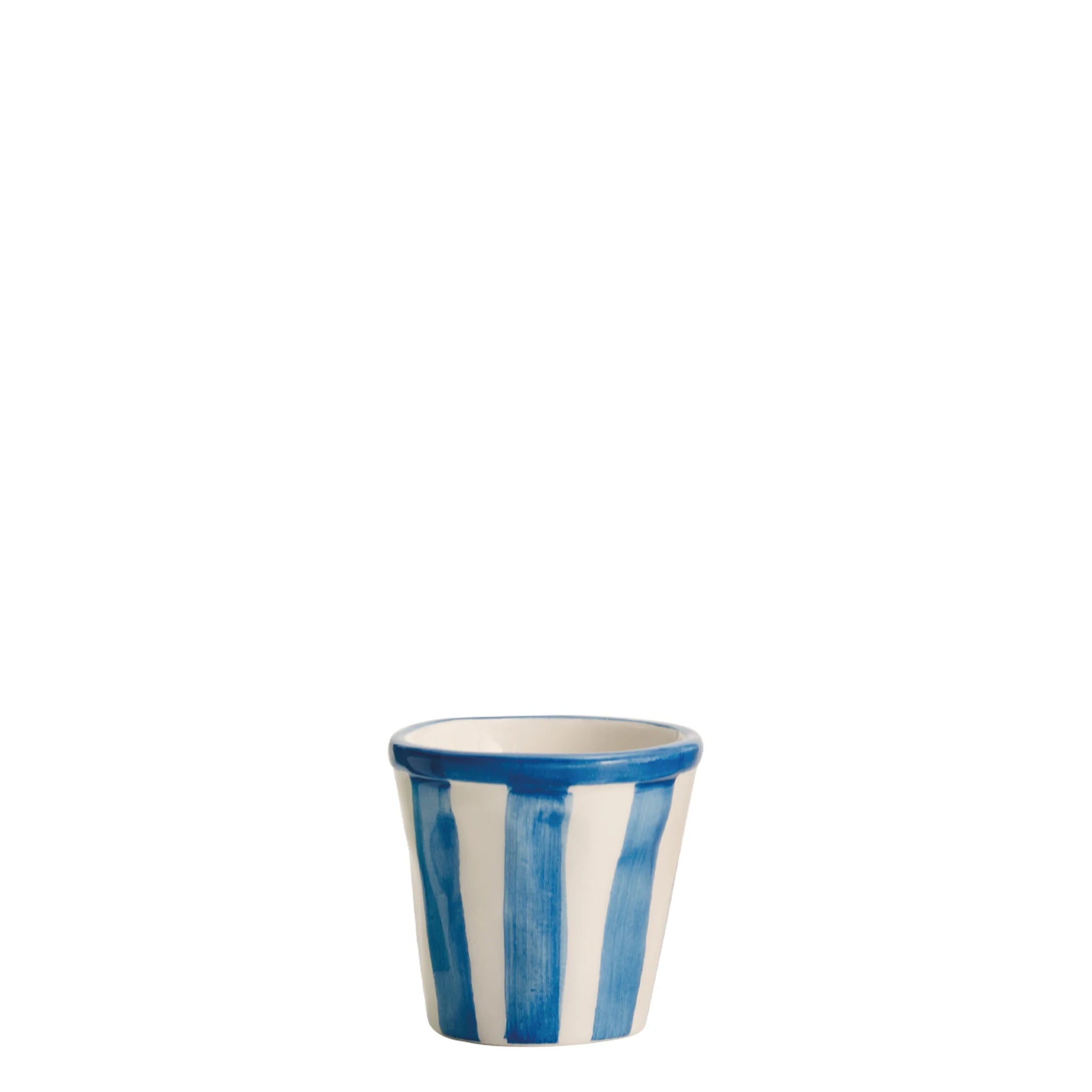 Ceramic cup with blue and white stripes on a white background