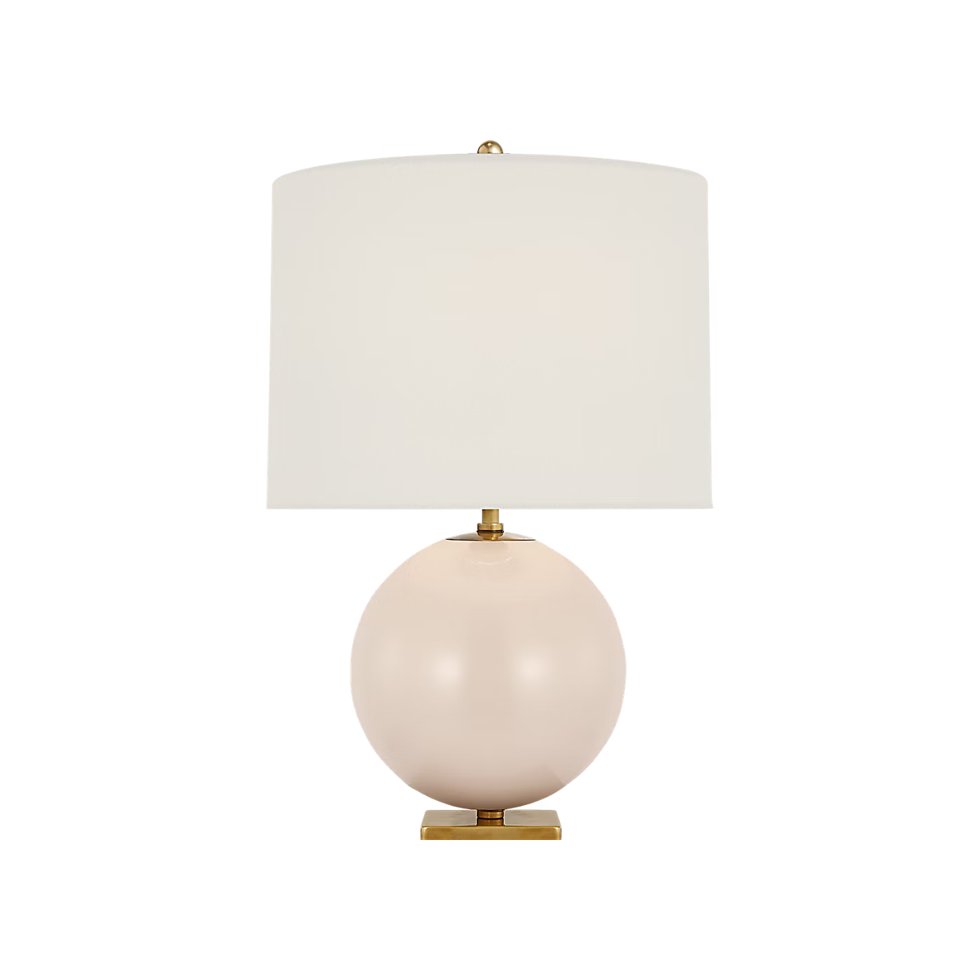 Table lamp with a round pink base and white shade on a black background