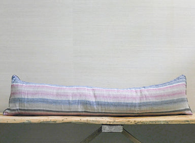 long rectangle pillow with pink, natural, and black horizontal stripes
