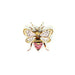 Decorative bee charm with gold and pink details on a white background