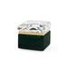 Box container with a clear glass top and green base on a white background