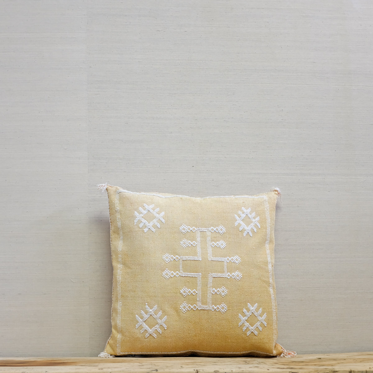 goldenrod color square pillow with embroidery