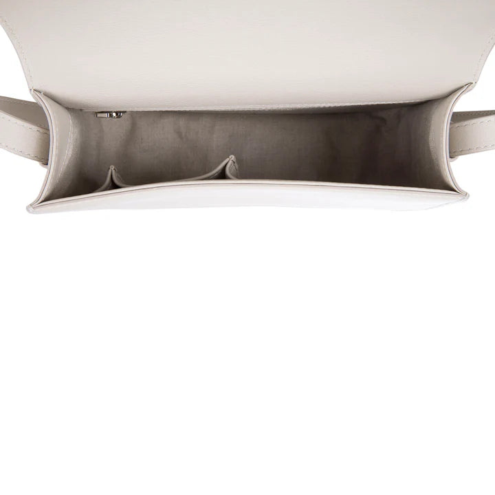Close-up of a modern ceiling light fixture with a white finish.