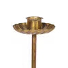Brass candle holder on a white background